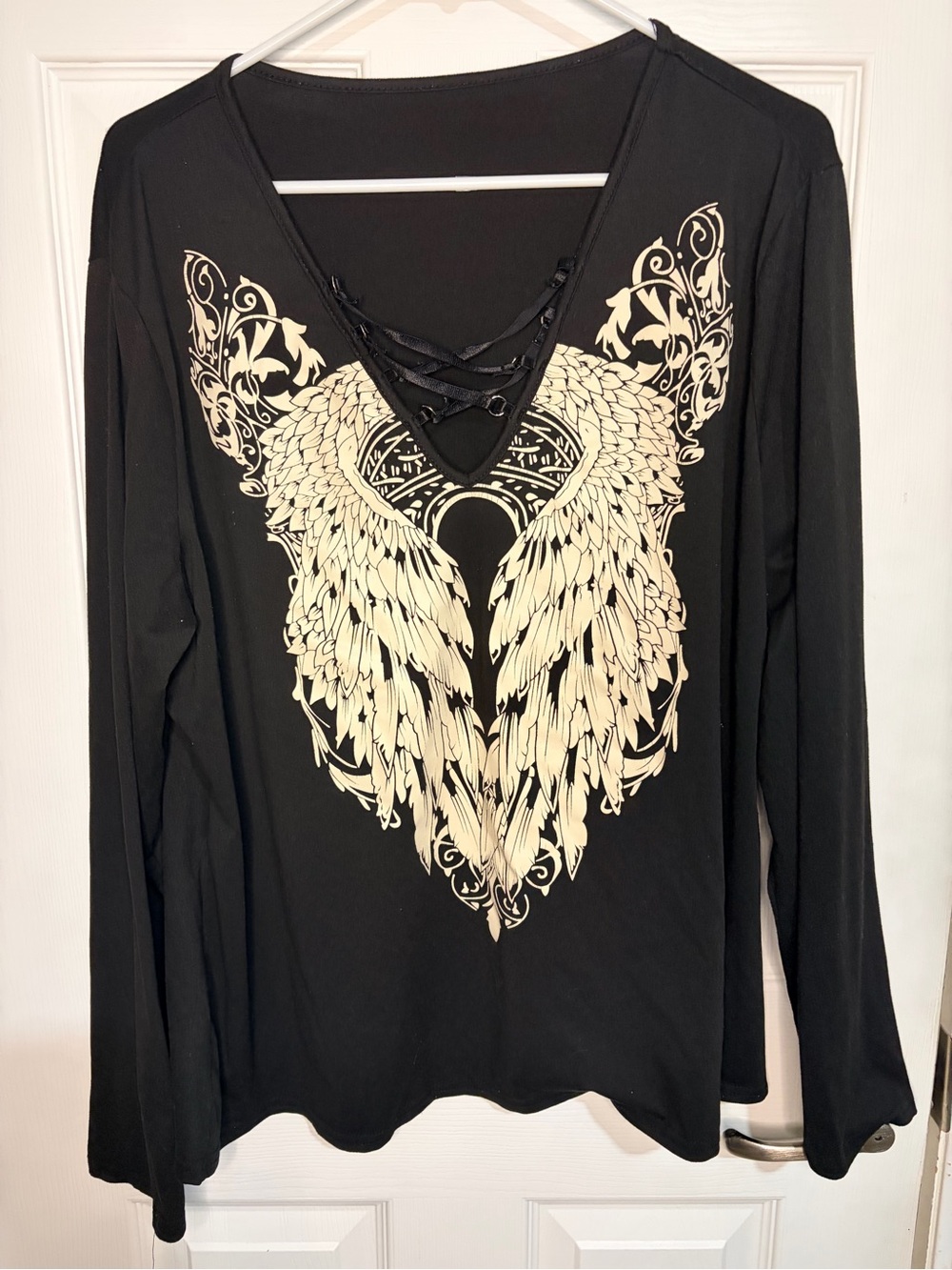 Black Lace-Up V-Neck Long Sleeve Top with Cream Wing Graphic